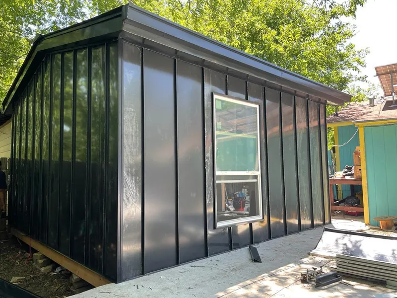 Black standing seam metal wall panels for Roof Inspection in Palmerton